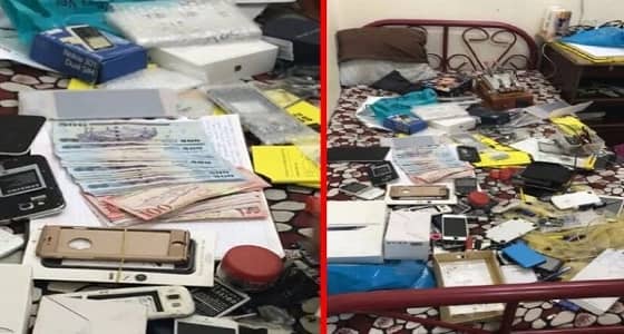 شرطة الرس تضبط وافد يصلح الجوالات " سرا "