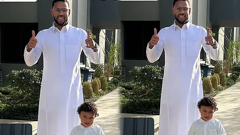 لودي وابنه في طريقهما إلى المملكة أرينا بالزي السعودي