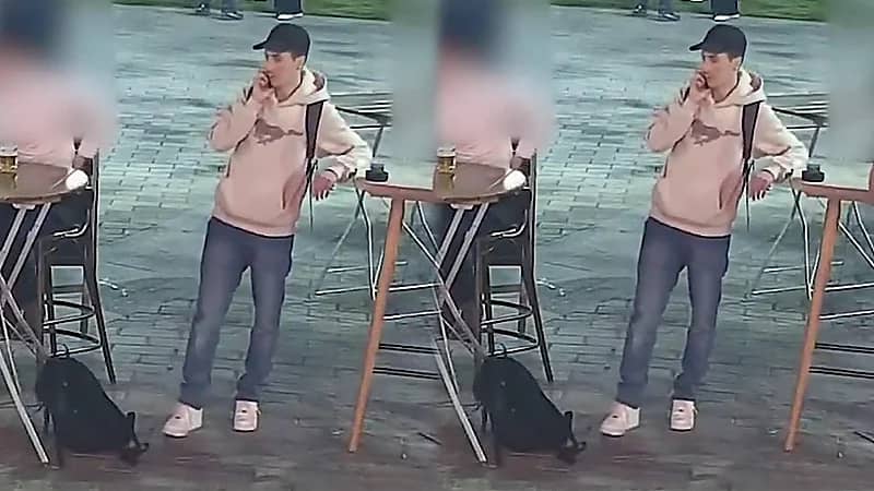 لص يتظاهر باستخدام هاتفه لتجنب لفت الانتباه ويسرق حقيبة من صاحبها باحترافية.. فيديو