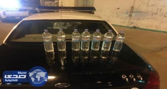 بالصور.. ضبط آسيوين متهمين بتصنيع وترويج العرق المسكر في القصيم