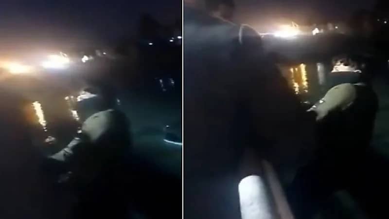 بالفيديو .. لحظة إيقاف شاب حاول الانتحار من أعلى جسر قديم بالعراق