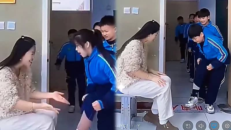 معلمة تفحص طلابها للتأكد من ارتدائهم لملابس الشتاء تحت الزي المدرسي ..فيديو