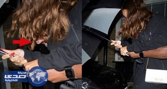 ريهانا تحاول إخفاء وجه صديقها العربي من كاميرات الباباراتزي