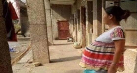 إمرأة  تحطم الرقم القياسي في حملها