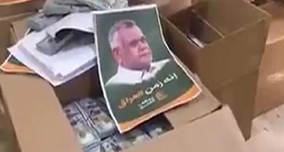 بالفيديو.. صناديق ممتلئة بالدولارات وصور لـ " العامري " قادمة من إيران