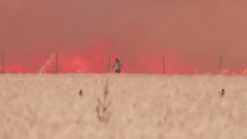 بالفيديو.. لحظة هروب رجل حاول إخماد النيران في قريته بإسبانيا