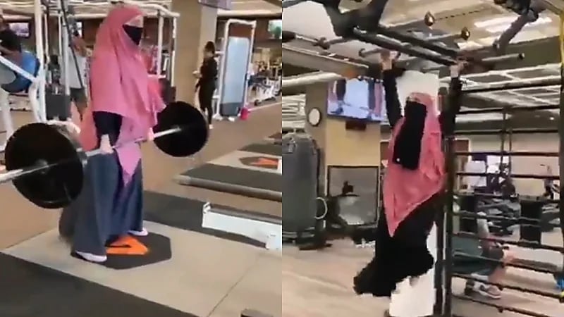 شاهد.. منقبة مصرية ترفع الأثقال وتتسلق القوائم الحديدية داخل صالة رياضية