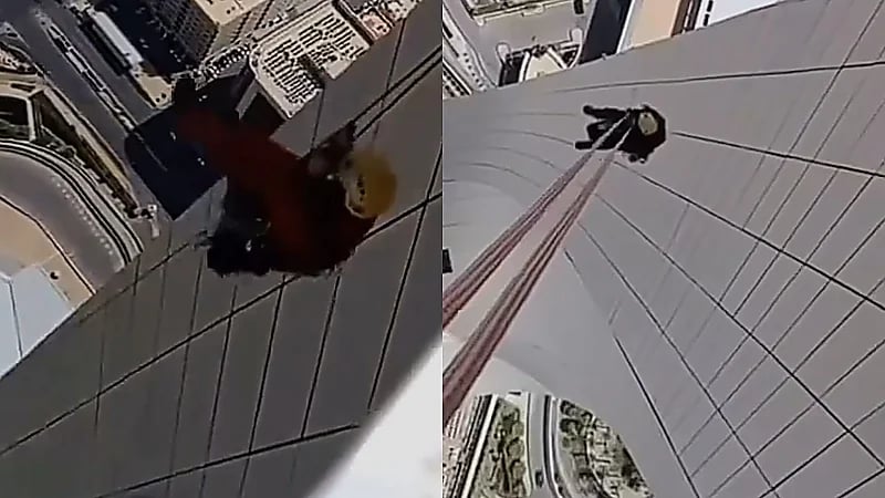 مشهد يحبس الأنفاس لطريقة تنظيف برج المملكة .. فيديو