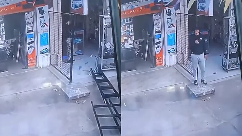 لحظة نجاة شاب من سقوط سلم من أعلى عقار ..فيديو