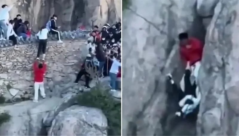 لحظات تحبس الأنفاس لزوجين ينزلقان من قمة جبل في الصين .. فيديو